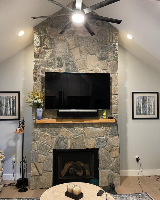 Interior natural thin veneer stone fireplace