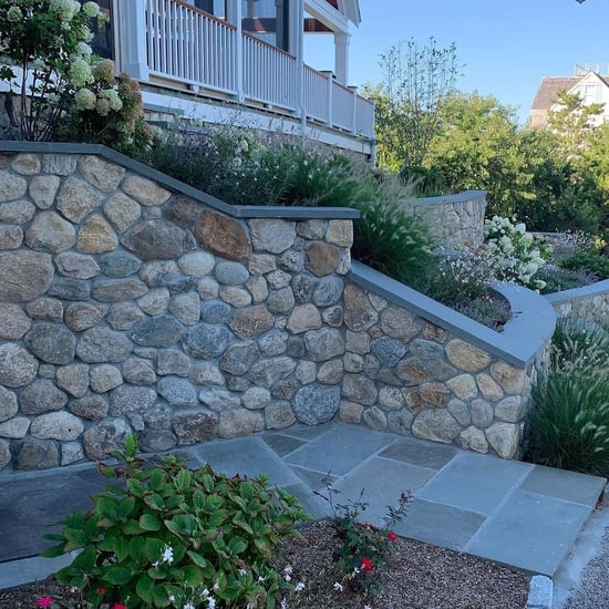 Old New England Rounds exterior walls and landscape design