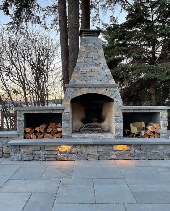 Connecticut Blend Ashlar fireplace with wood storage