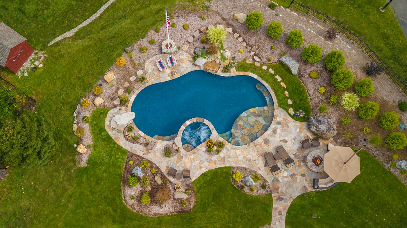 Outdoor Pool and Patio Design made with Natural Stone Flagstone