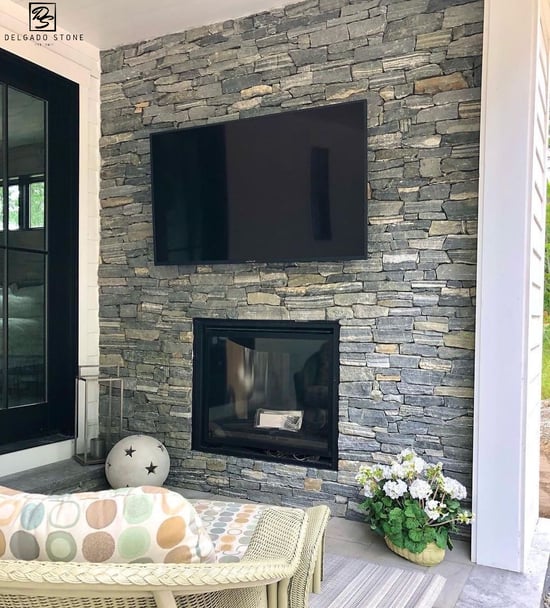 Transitional Space with Natural Ledgestone Fireplace