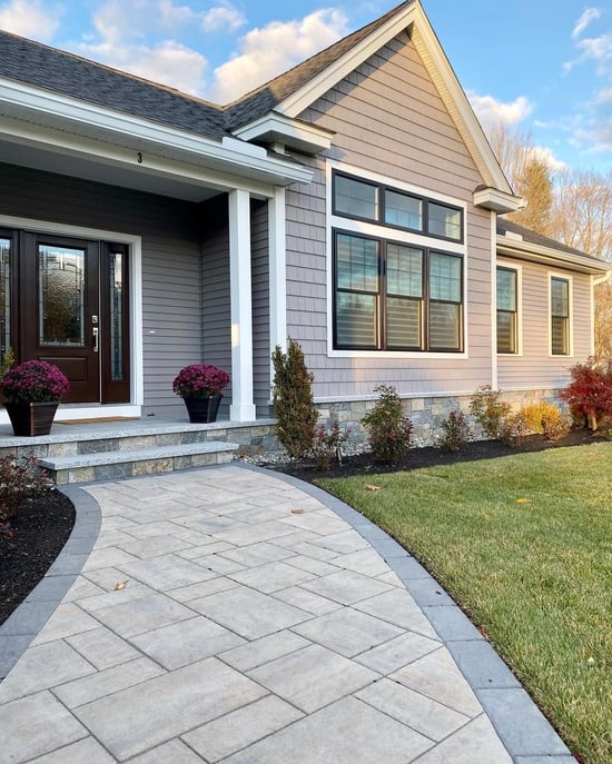 walkway and natural stone on home exterior