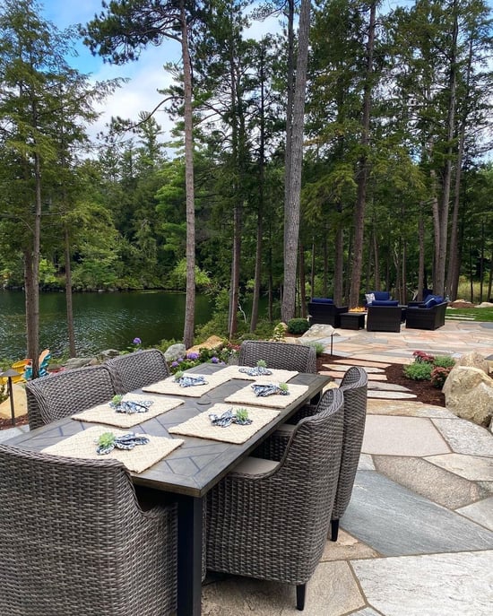 Outdoor dining table on natural stone patio