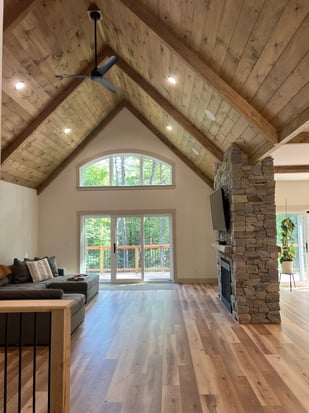 CT Blend Ashlar Fireplace with open layout and wood accents..