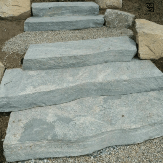 Liberty Hill Sawn irregular steps installed on a beach.