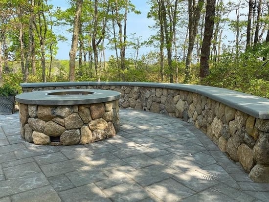 Old New England Rounds Fire Pit and Accent Wall with Intimate Landscape