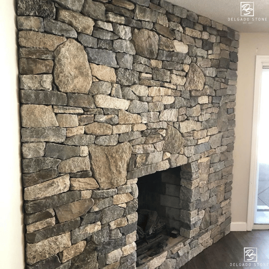 Old New England Wall Mosaic and Ledgestone Fireplace Wall