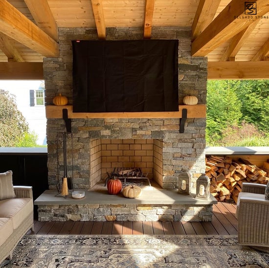 Spruce Mountain Ledgestone Exterior Fireplace with Covered Patio