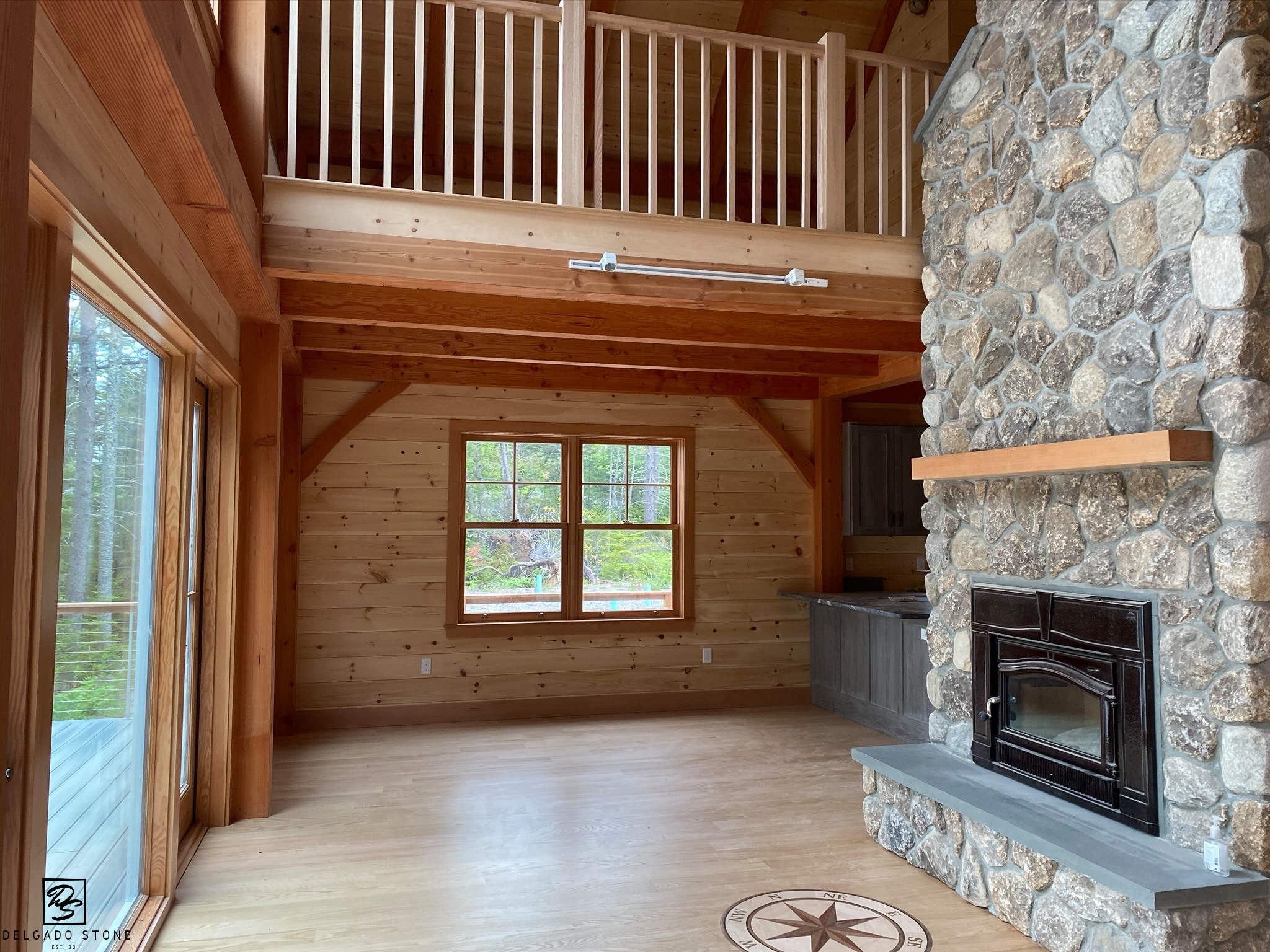 4 Stone Fireplaces That Shine Alongside Wood